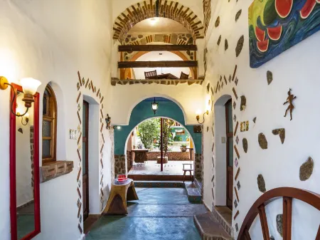 Casa Miguel Arcangel Отели в г. Коатепек