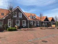 Friesischer Hof, Ferienwohnungen Mit Indoor Spielplatz, Kostenfreien Parkplatz Und W-Lan Hotel di Norddeich