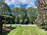 New Deck!  Private 1 Acre Family Friendly Home - Heated Pool, Home Office & Gym