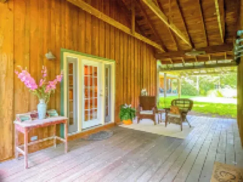 Cozy CHQ Farmhouse Escape by Stream & Cabin - 2.8mi to Main Gate, sleeps 12!