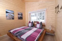 Log cabin by the lake with sauna and fireplace in the middle of the Harz mountains and forests