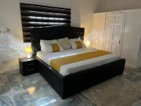 GHL. G Floor En-Suites 2Br Sleep 4. WiFi, Dstv, Solar ,AC and Free Breakfast فنادق في کاسوا