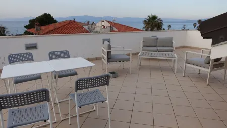 super Penthouse just 50m from the beach Отели в г. Бриатико