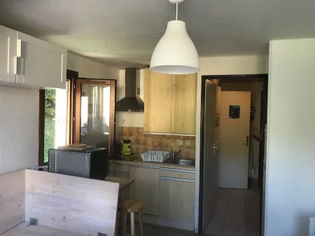 Studio with sleeping area for small family.