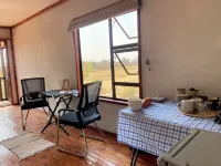 Cozy wooden cabin overlooking the foot of the Tswapong Hills in Palapye.