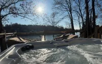 3-bedroom modern mid century cabin! Hot tub, fire pit and lake front