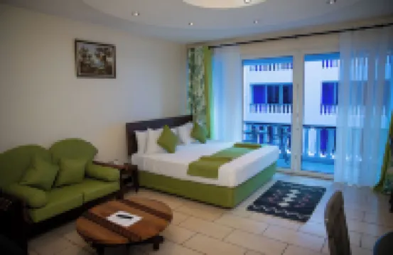 Cowrie Shell Beach Apartments Official