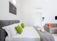 Monolocale Riva – Wi-Fi, Clima e Giardino a Torre Lapillo - 4-Star