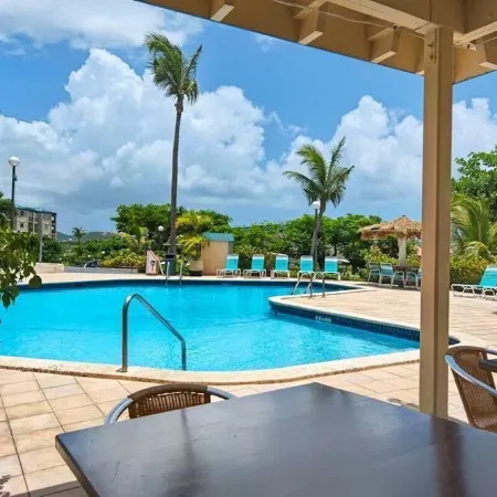 Updated: Luxe Condo Steps from Sapphire Beach!