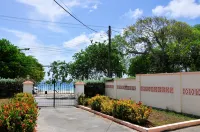 Welcome to the unpretentious and breezy Graceville, steps away from the beach Hotels near Gibbs Bay