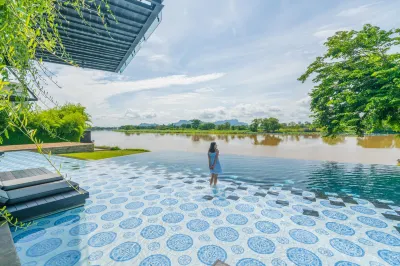The Xcape Hotel River Kwai Hotels near Wat Phothisat Banpotnimit