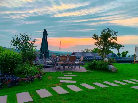 Lizhuang Half-Acre Blossom Field Homestay Отели рядом с достопримечательностью «Li Zhuang Lv You»