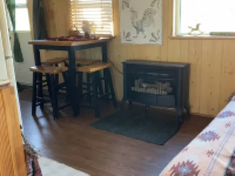 Located Behind a Tree Filled Garden Near Our Horse Barn and Farm Sanctuary. Hotels in Swan Township