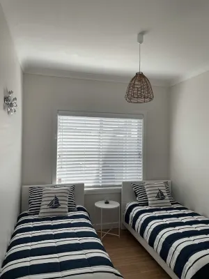 Two bedroom villa with private courtyard, a short walk to Manyana Beach.