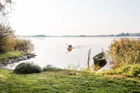 Vacation apartment directly on the lake with private access.