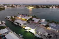 Oceanside waterfront 2/2 home with 55ft dock and paddle equipment