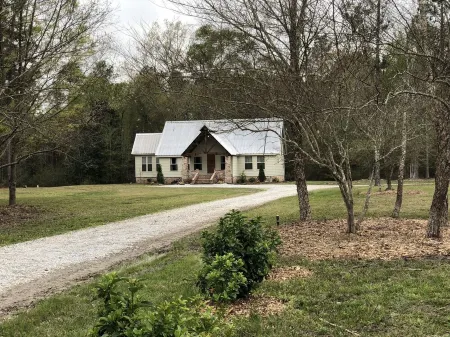 "Rustic Retreat" Timber Frame near Sam Houston Jones State Park & Casinos