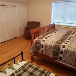 Two story authentic log construction home, built in 1936 with two fireplaces.