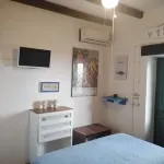 the blue strawberry tree apartment