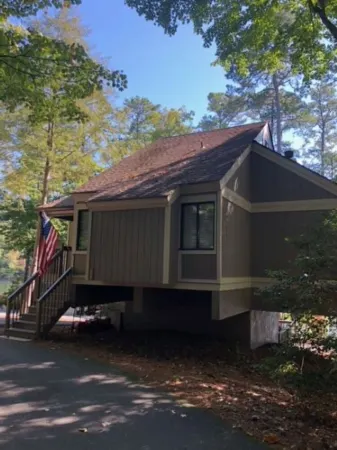 Big Canoe cottage on Lake Sconti with water and golf course views