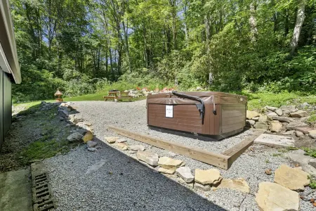 Outdoor Hot Tub & Indoor Soaking Tub, Bonfire Pit, Picnic Area, Foosball & More