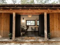 Japanese timberframe tiny house perched on side of Lookout Mountain Hotels in Dade County
