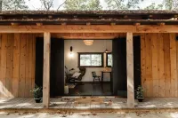 Japanese timberframe tiny house perched on side of Lookout Mountain