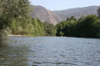 Center model of lux triplex with kaweah river running by property. Hotels in Three Rivers