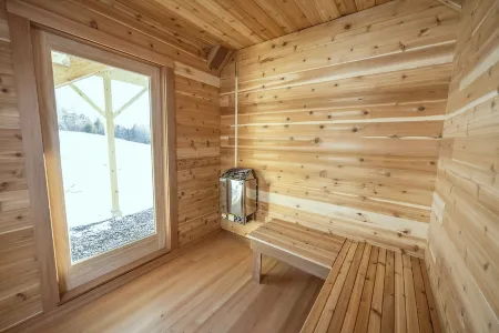 Insanely romantic treehouse perched next to a stream and rolling hills.