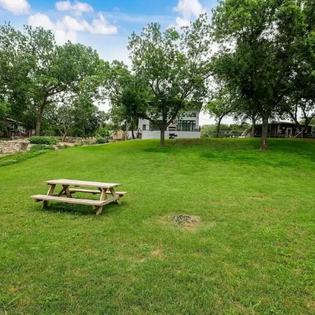 Modern River Home on 1/2 Acre with 101' of Private River Frontage.