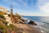 Spectacular Ocean Views! Steps to Beach! Private Patio and 1 Car Garage!