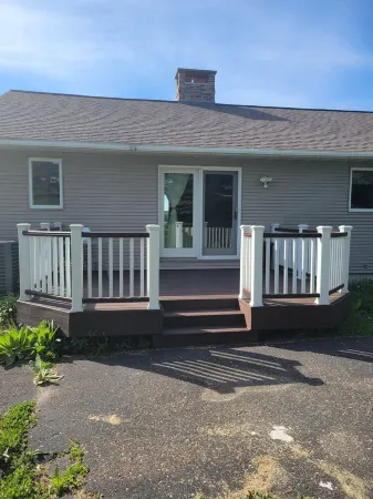 Spacious home in Hancock Twp. Includes indoor sauna! Pet-friendly.