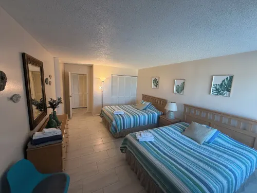 Dolphin Beach condo with indoor pool, ocean views, steps to the beach