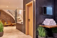 To pamper yourself: Whirlpool, sauna, relaxation area, garden, barbecue, view of the mountains