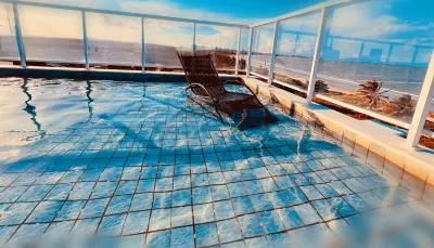 天堂 Pé 在沙灘上 酒店