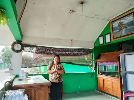 Hotel Bukit Sentabi Penembahen Отели в г. Делисерданг