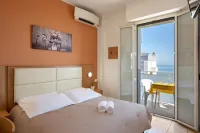 Amadei Hotel Figaro & Apartments Hotels near Cozza Amara