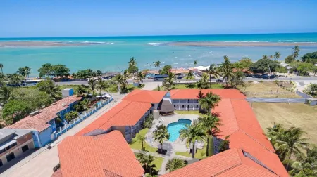 Sueds Segundo Sol Отели рядом с достопримечательностью «Coroa Vermelha Beach»