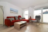 Geräumige Ferienwohnung im Erdgeschoss für bis zu 4 Personen und Hund Hotel di Krummhorn