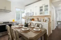 Luxurious Outdoor Hot Tub and Elegant Furnishings - Charming Escape