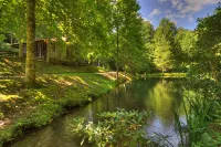 Nature Retreat with Scenic Trails and Fishing Pond - Charming Oasis