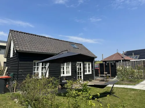 Rust en Ruimte in een Knusse Cottage aan de Lek Naast Werk aan het Spoel