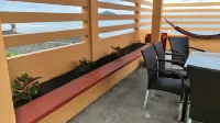 Relaxing beach side condo with mountain and island views.