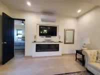 Pristine 3-bed, 3.5-bath villa with mountain, golf course, sea views & hot tub