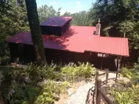Red Bend cabin overlooking the river with hot tub.