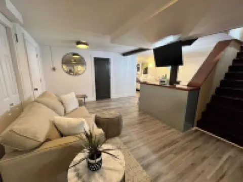 Spacious basement apt. Off-street parking, washer & dryer, kitchenette, sleeps 4