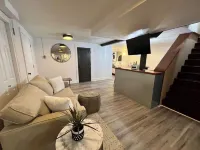 Spacious basement apt. Off-street parking, washer & dryer, kitchenette, sleeps 4