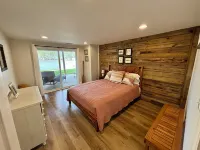 Spacious 7-bedroom, 5-bath home on 168' of a wide, deep-water cove.