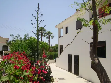 Two very large, bright apartment with private garden, pool and grill