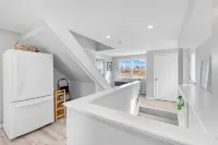 FULLY RENOVATED apt w/water views and deck near beach& marina